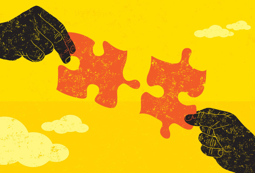 Finding a Solution
Two hands connecting puzzle pieces to find the solution. The hands and puzzle pieces are on a separate labeled layer from the background.